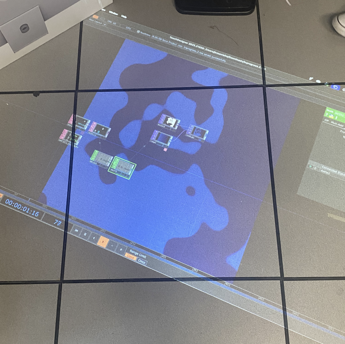 The initial projection mapping was done with a projector within AA1A. We just initially wanted to test getting the projection to connect to the computer. 